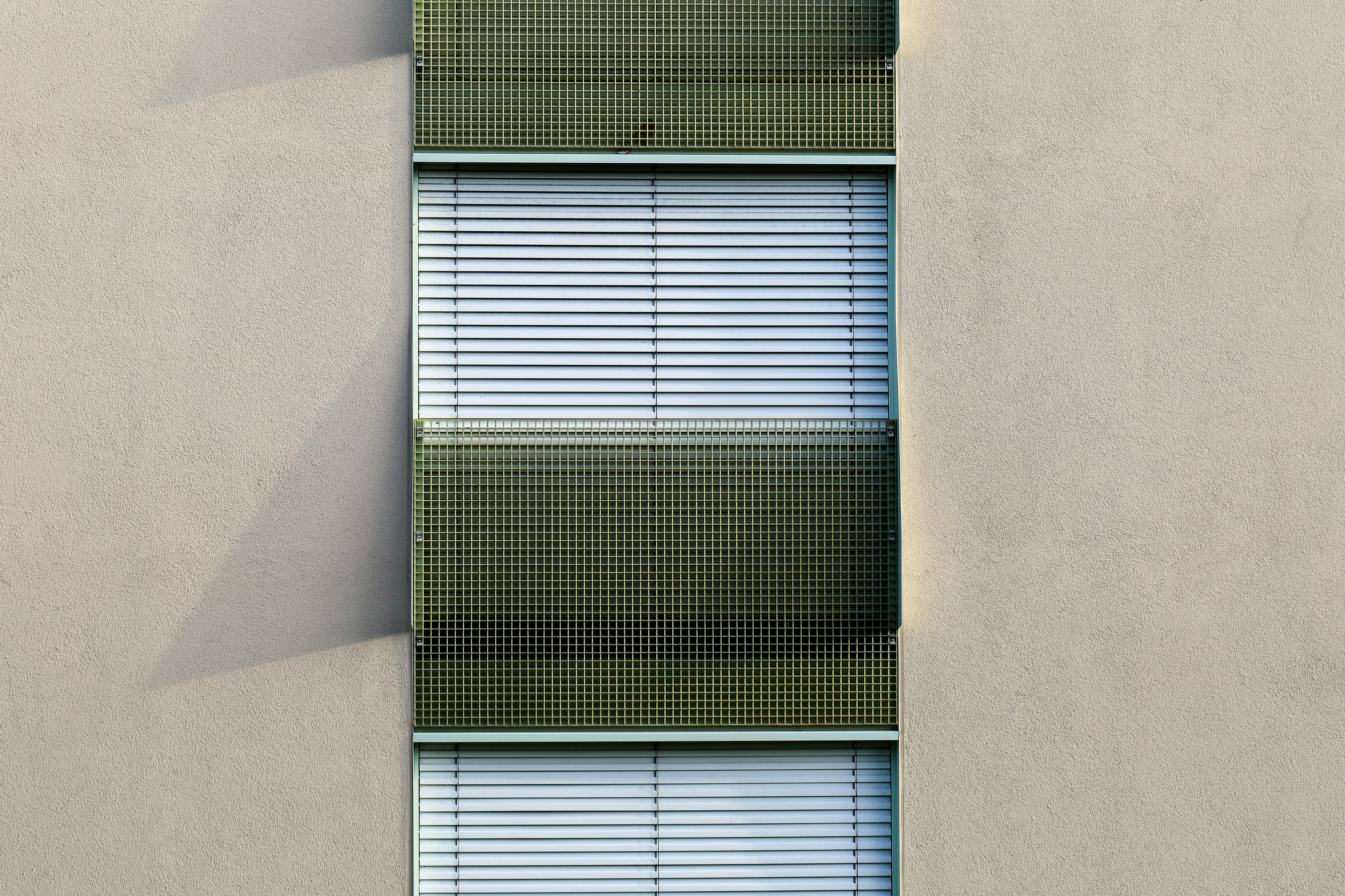 white venetian blinds on building